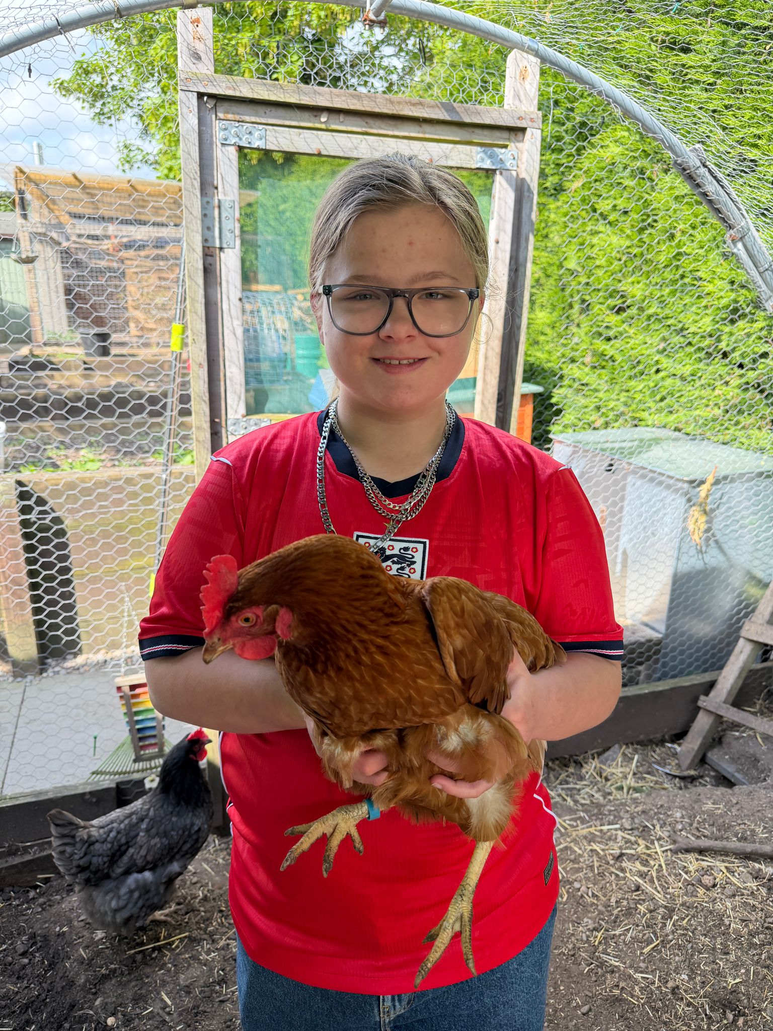 A participant interacting with an animal at Areterra