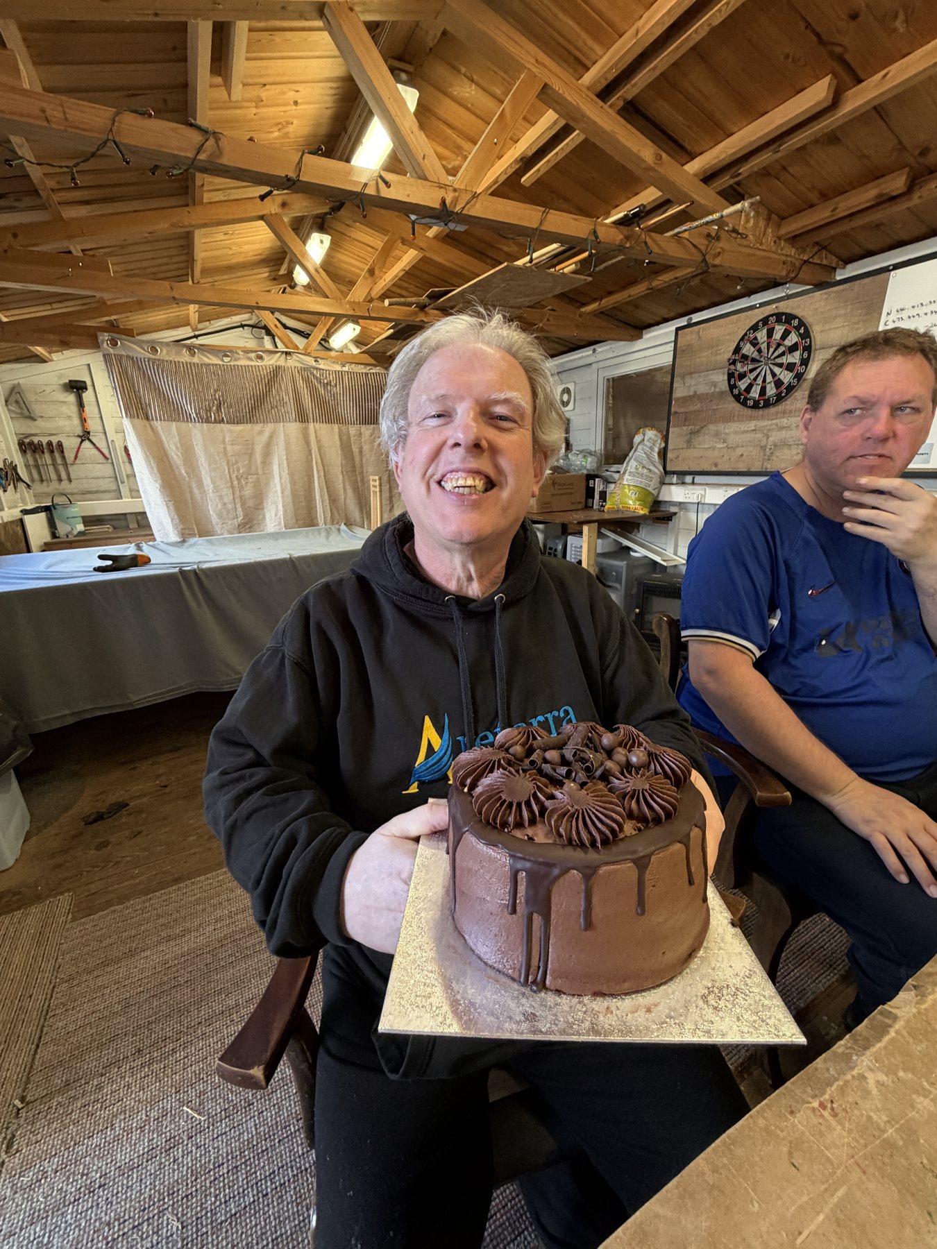 Sharing a cake celebration at Areterra